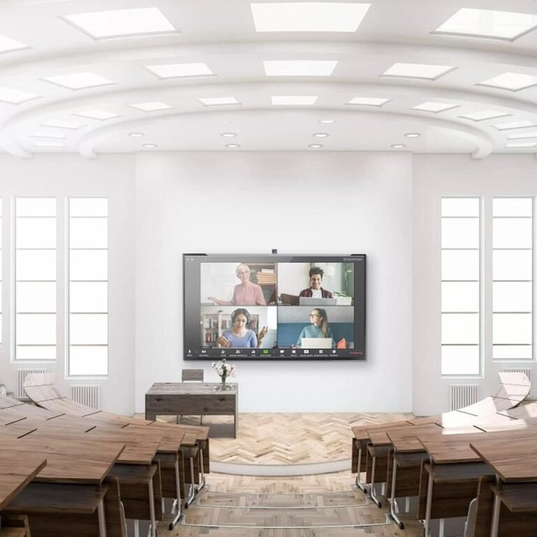 LED display installed in a bright school auditorium and presentation space